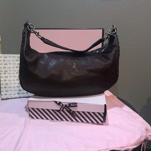 Juicy Couture vintage leather hobo practical!